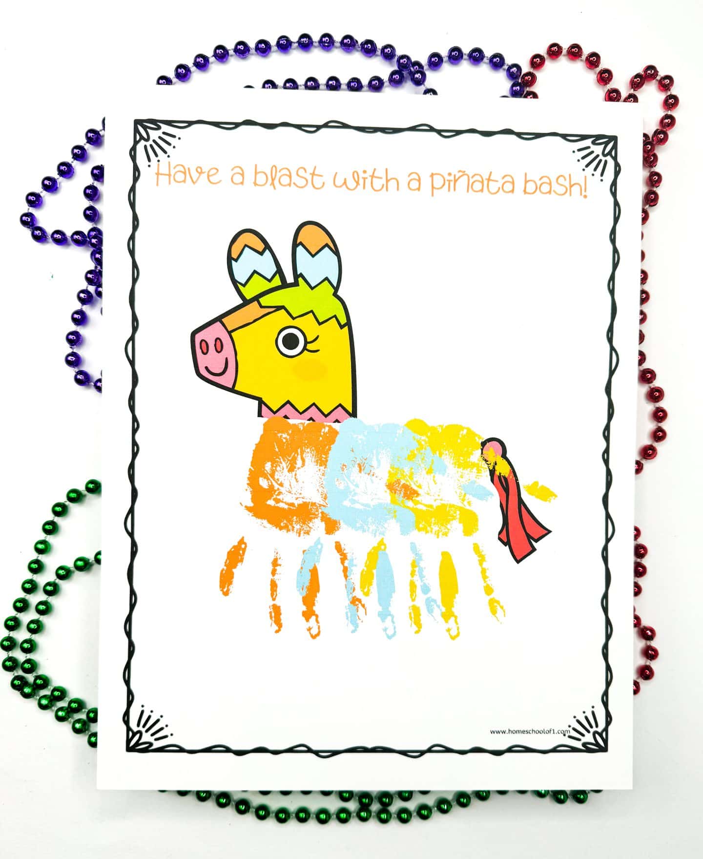 A colorful handprint art representation of a piñata, accompanied by the text "Smash it!" capturing the excitement of the traditional activity.