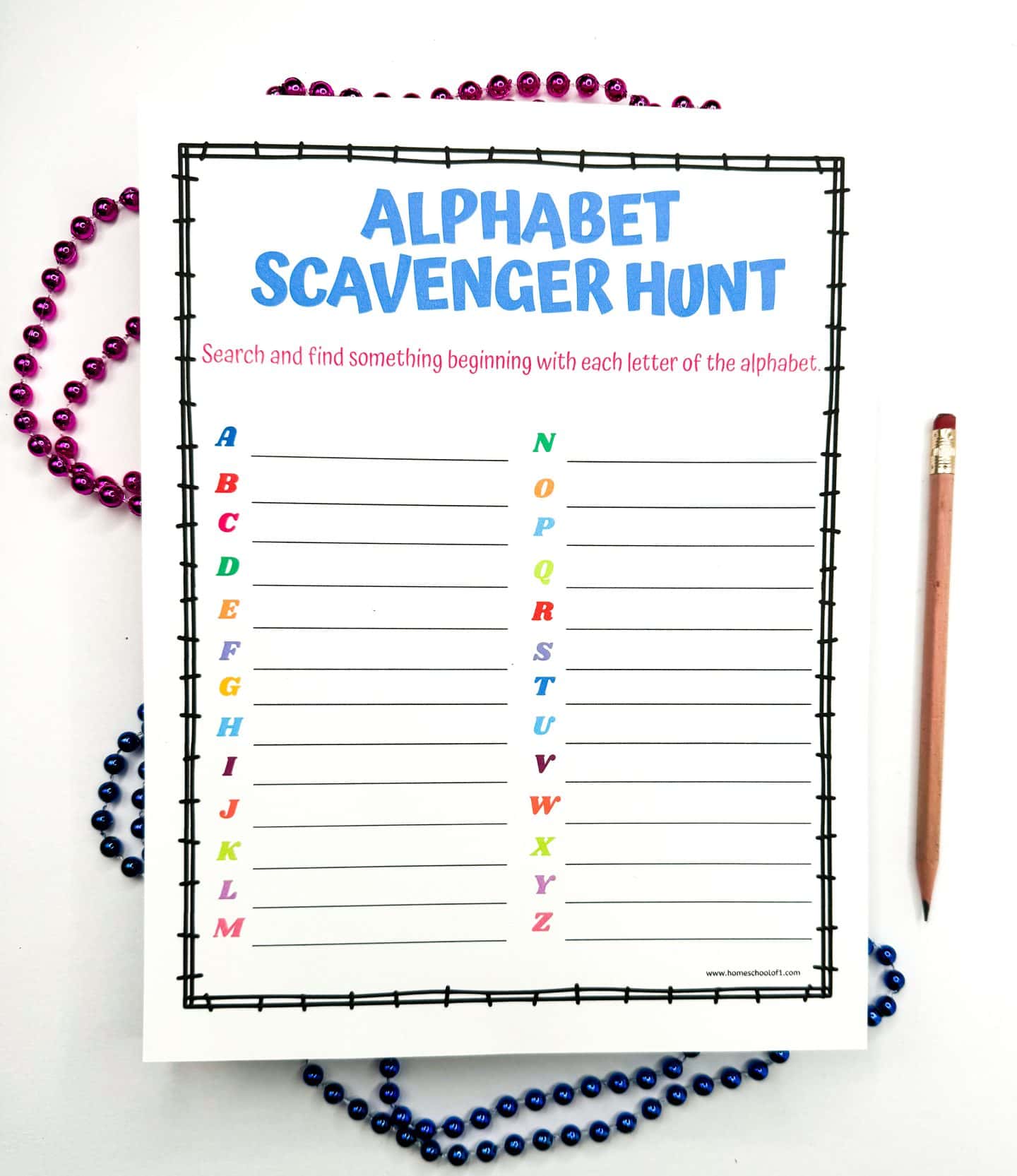 An Alphabet Scavenger Hunt worksheet with a blue header and a list from A to Z with blank lines for answers, accompanied by purple and blue beads and a pencil.