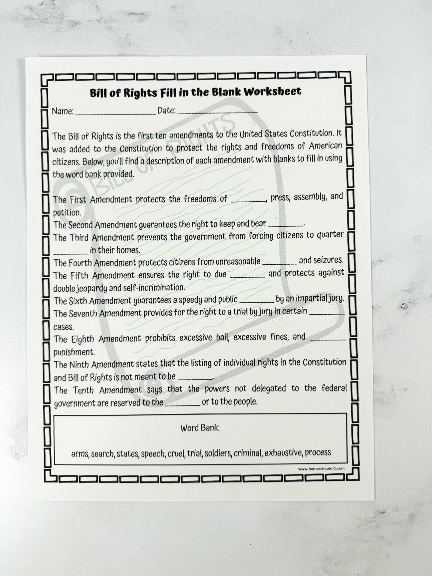 A "Bill of Rights Fill in the Blank Worksheet" for students, framed with a border and containing ten short descriptions—one for each of the first ten U.S. constitutional amendments—with blank spaces for students to fill in using a provided word bank. The word bank includes: arms, search, states, speech, cruel, trial, soldiers, criminal, exhaustive, and process. The worksheet is laid on a white marble surface.

