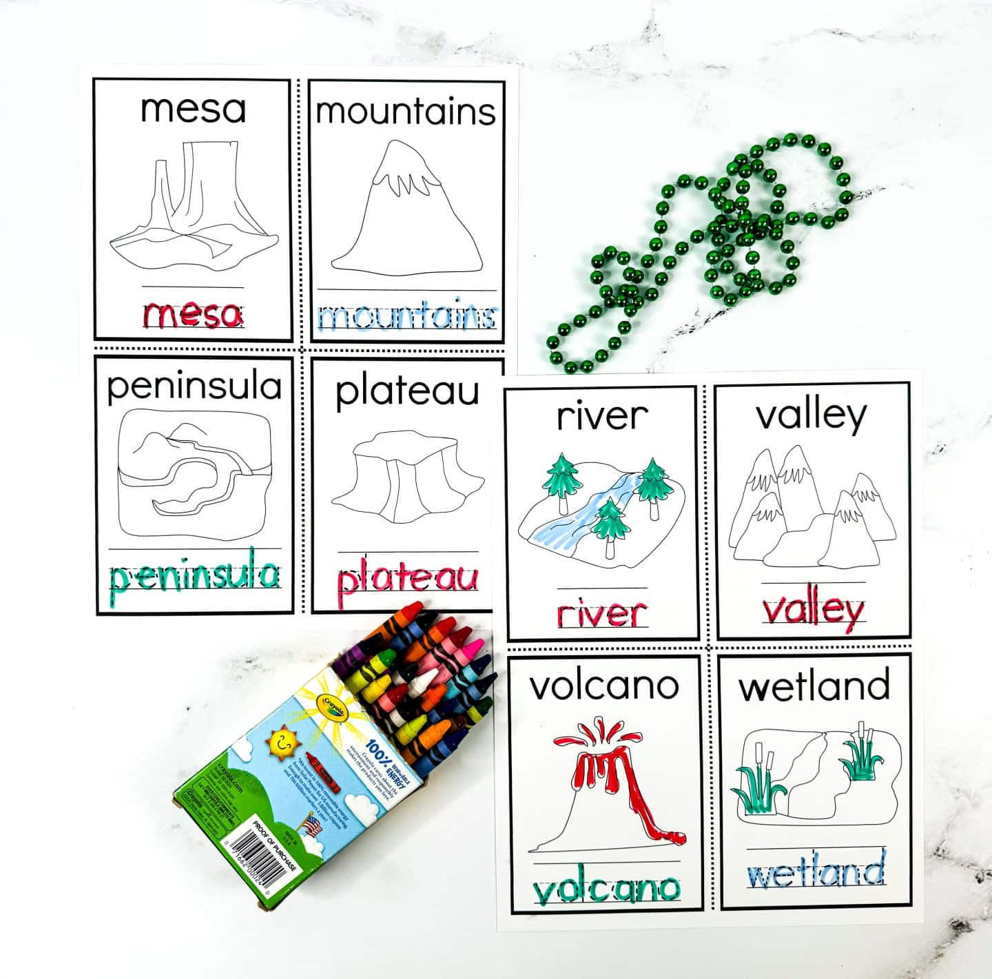 free printable landforms worksheets featuring mesa, mountains, penunsula, plateau, river, valley, volcano, wetland. a space to color in and trace the letters for the words.