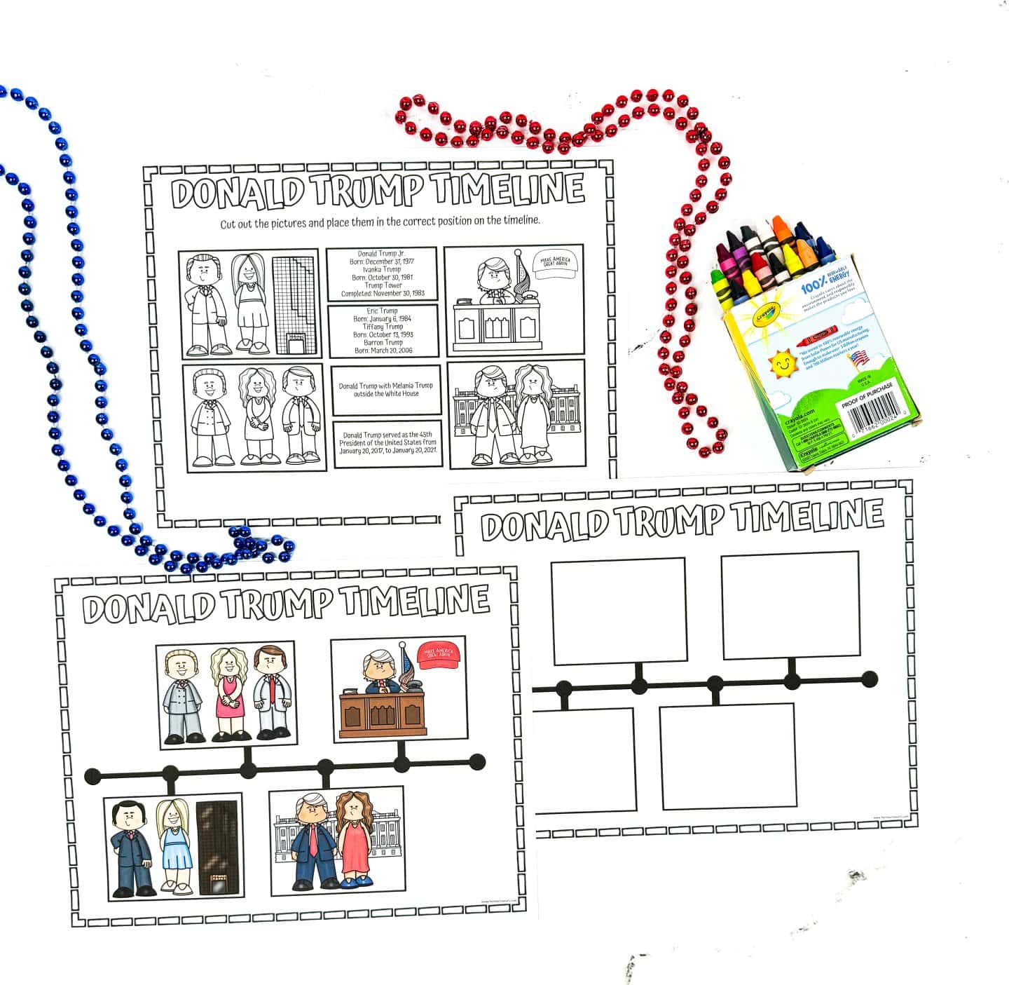 Three printable Donald Trump Timeline worksheets are displayed, featuring cartoon illustrations and text to help kids place life events in chronological order. One sheet includes cut-out pictures and descriptions, another shows the completed timeline with events colored in, and the third is a blank timeline ready for assembly. Red and blue beaded necklaces and a box of Crayola crayons add a colorful, playful touch to the educational setup.
