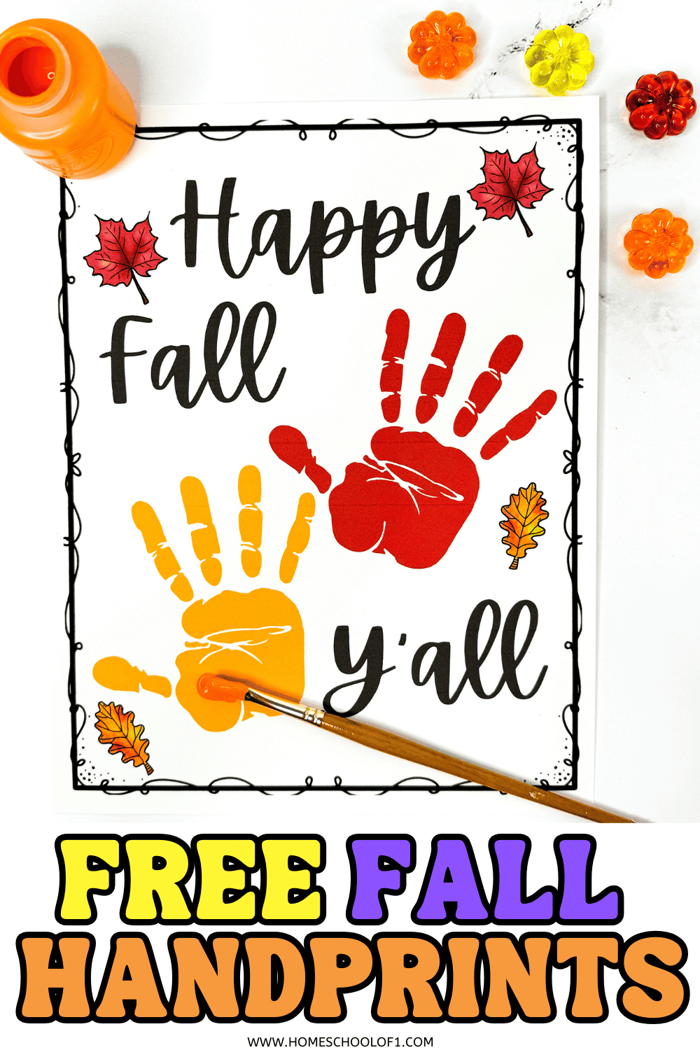 Fall handprint art printable with orange and red painted handprints reading “Happy Fall Y’all,” surrounded by leaves and paint supplies.