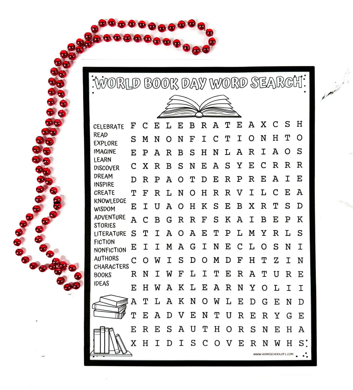 Black and white printable titled “World Book Day Word Search” with a drawing of an open book and a grid of letters. On the left, 20 themed words such as “IMAGINE,” “READ,” “CHARACTERS,” and “KNOWLEDGE” are listed for students to find. The design includes illustrations of stacked books and a strand of red beads placed beside the worksheet.

