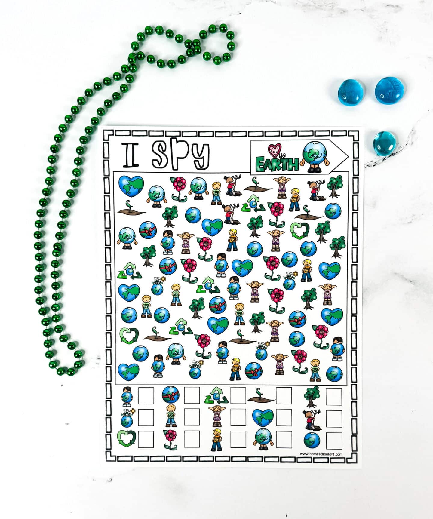 Colorful Earth Day I Spy worksheet featuring diverse characters, globes, recycling symbols, trees, and heart-shaped Earth icons. This printable Earth Day activity helps kids sharpen observation skills while learning about sustainability and environmental awareness.