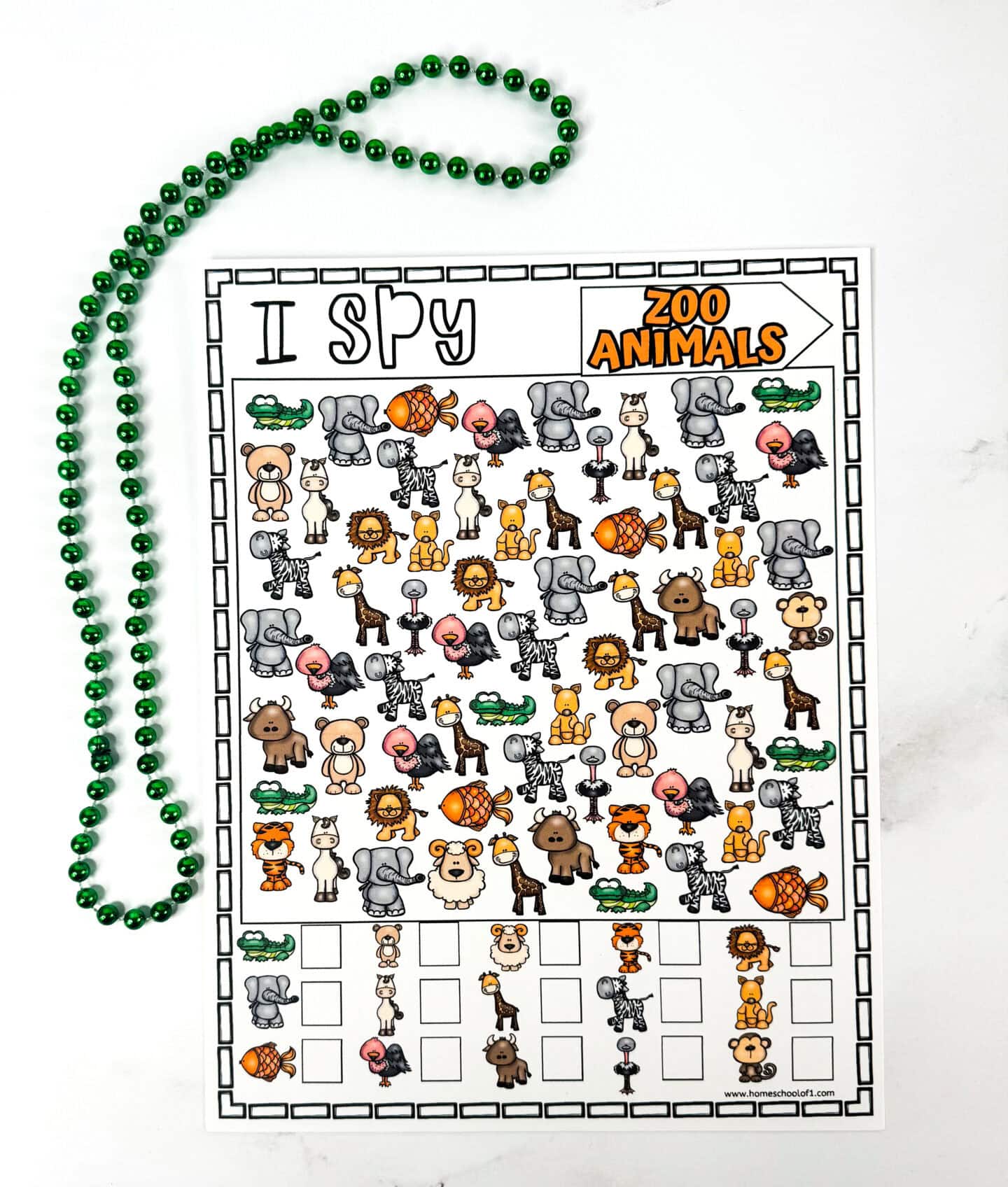  A colorful “I Spy Zoo Animals” printable activity sheet featuring illustrated animals like elephants, crocodiles, lions, zebras, flamingos, giraffes, and fish. The page includes a counting section at the bottom and is set on a white background with a green beaded necklace beside it, making it a fun and educational seek-and-find game for kids.