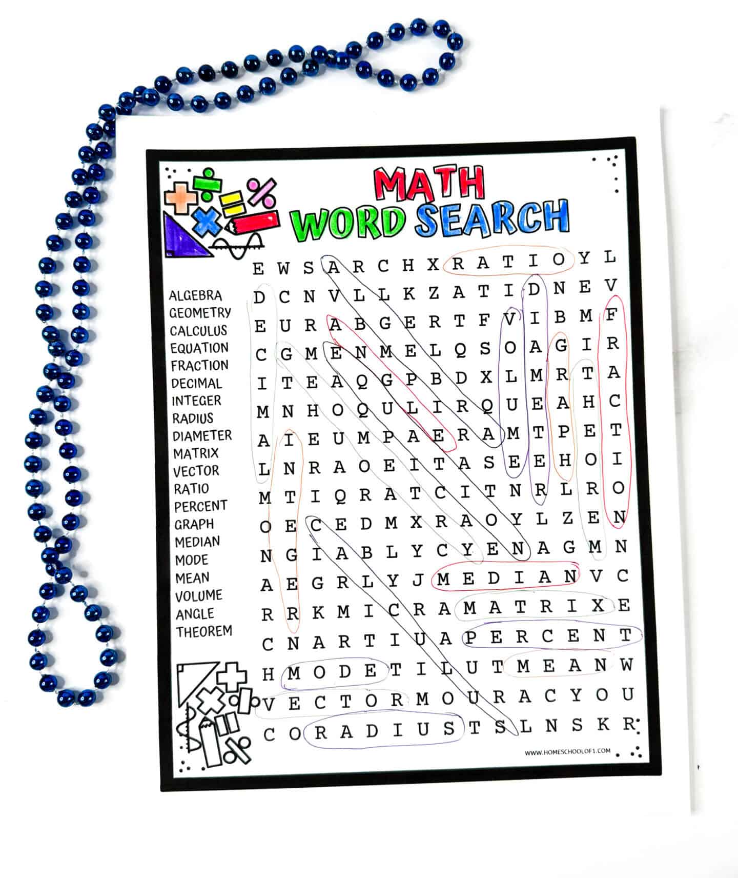 Completed math word search with circled answers and blue beads on the side.