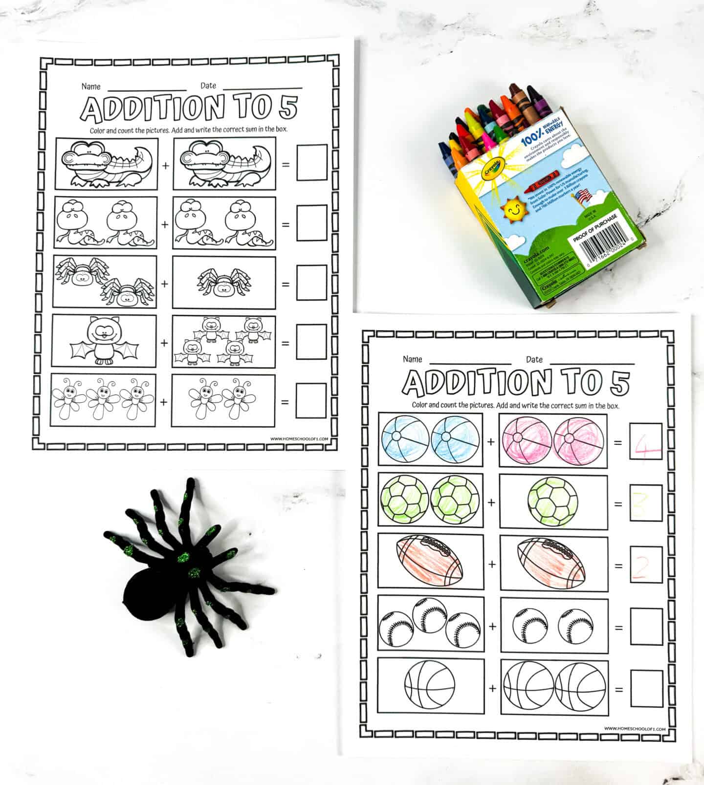 Two addition to 5 worksheets for kindergarten featuring animals, insects, and sports balls, shown with crayons and a spider prop.