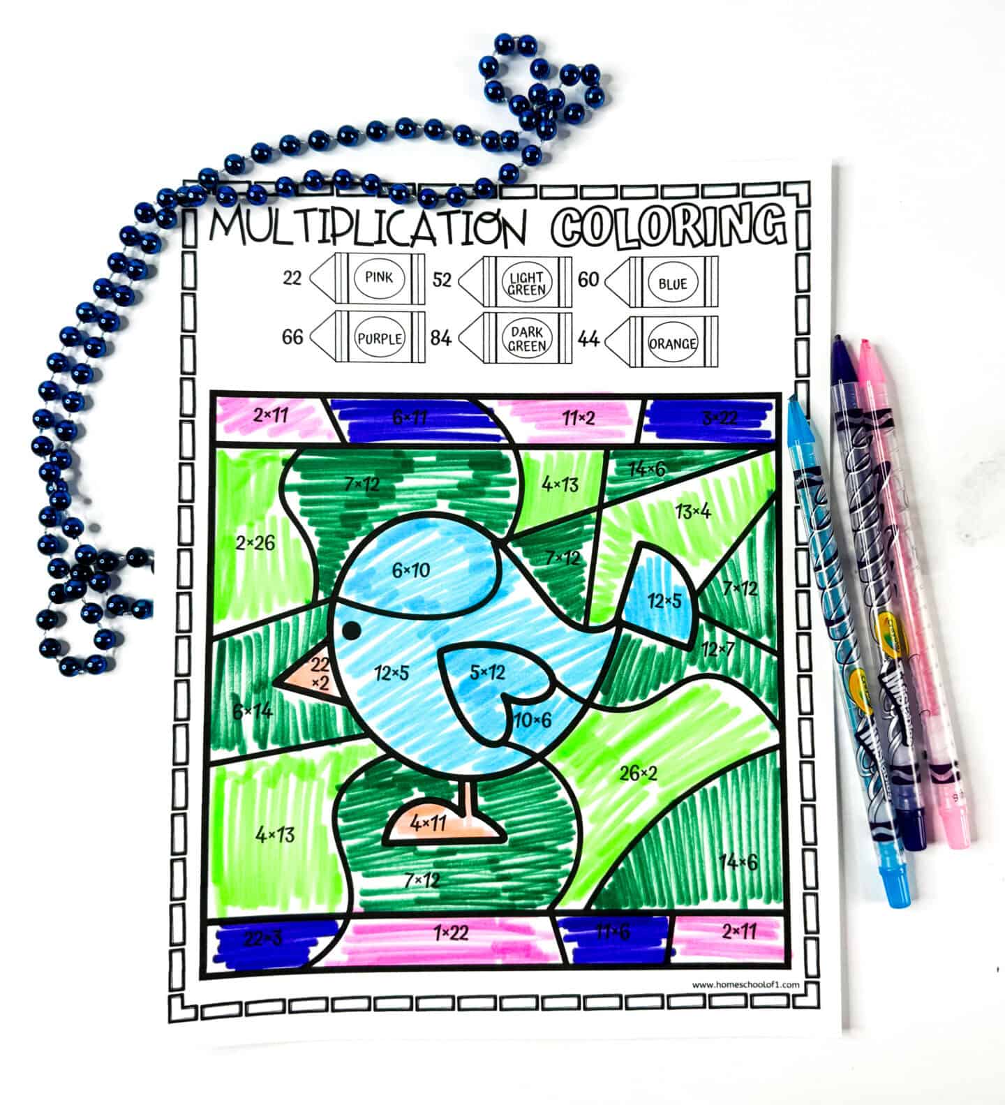 Color by number multiplication worksheet featuring a completed blue bird image, with multiplication facts solved and colored.