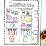 Free printable addition to 5 worksheet with clothing items for kids to count, color, and solve simple math problems.