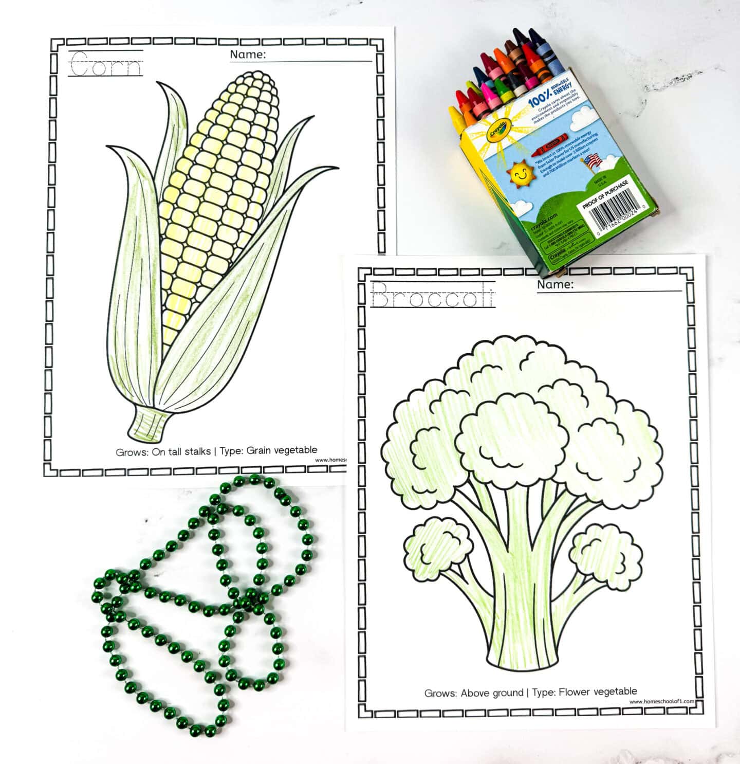 Corn and broccoli vegetable coloring pages with green beads and Crayola crayons.