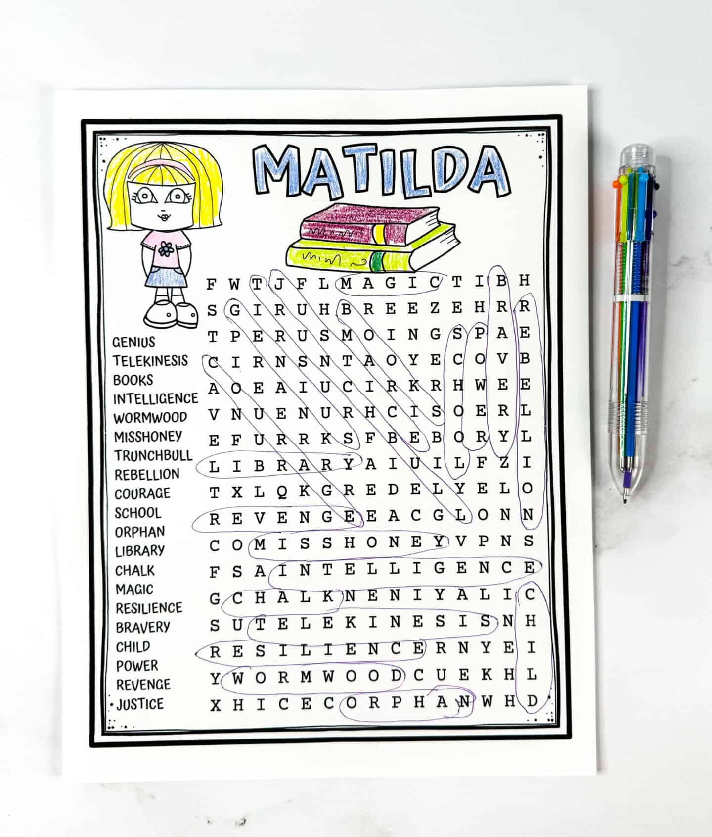 Colored Matilda word search puzzle printable with 20 themed vocabulary words from Roald Dahl’s book, alongside a multicolor pen.