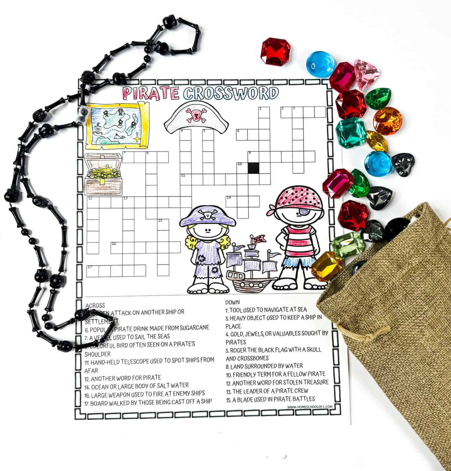 Partially colored pirate crossword puzzle worksheet with pirate necklace and colorful gems.