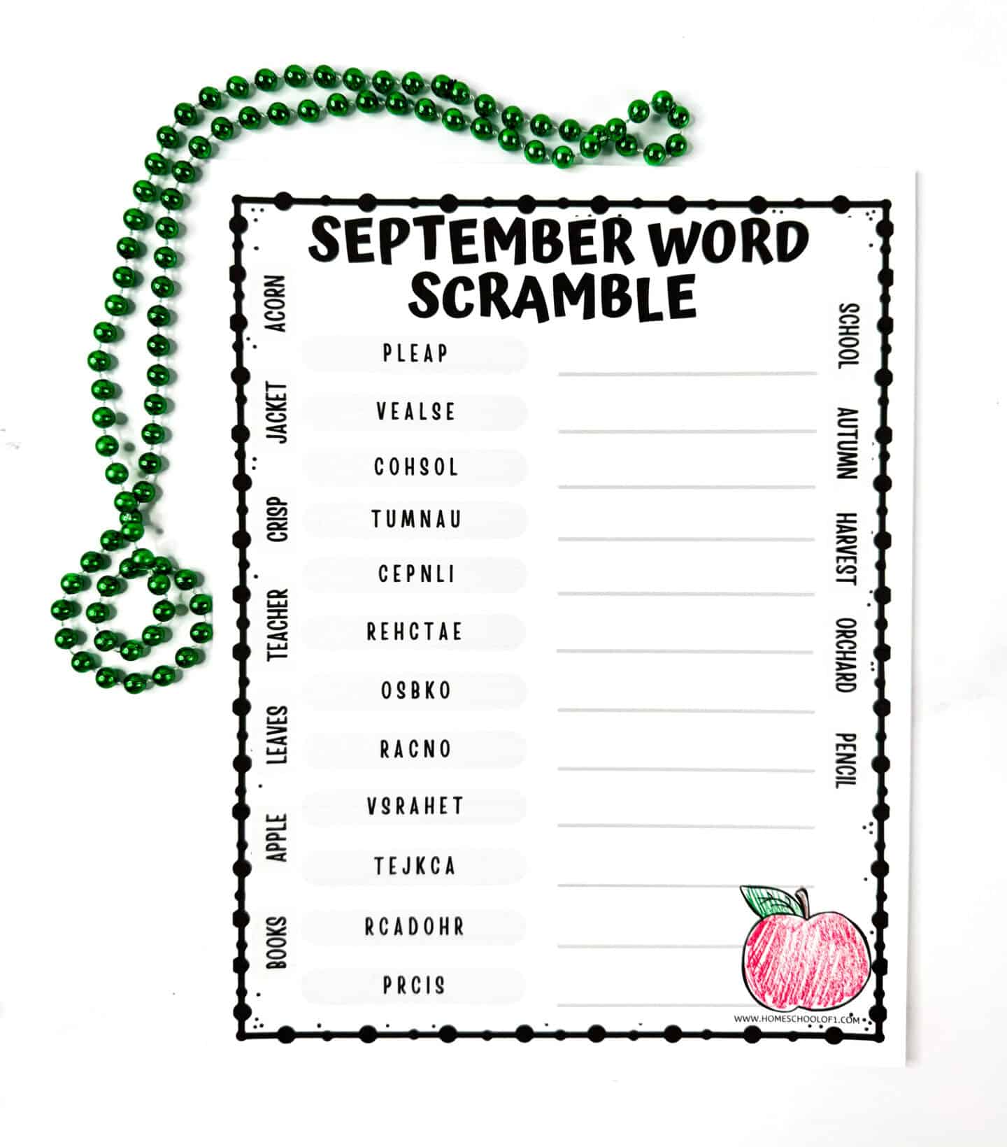 Blank September word scramble printable with word bank around the edges and a red apple to color.