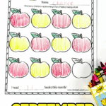 September reading log printable filled in with red and yellow apples, child’s name written at the top, crayons placed on the right side