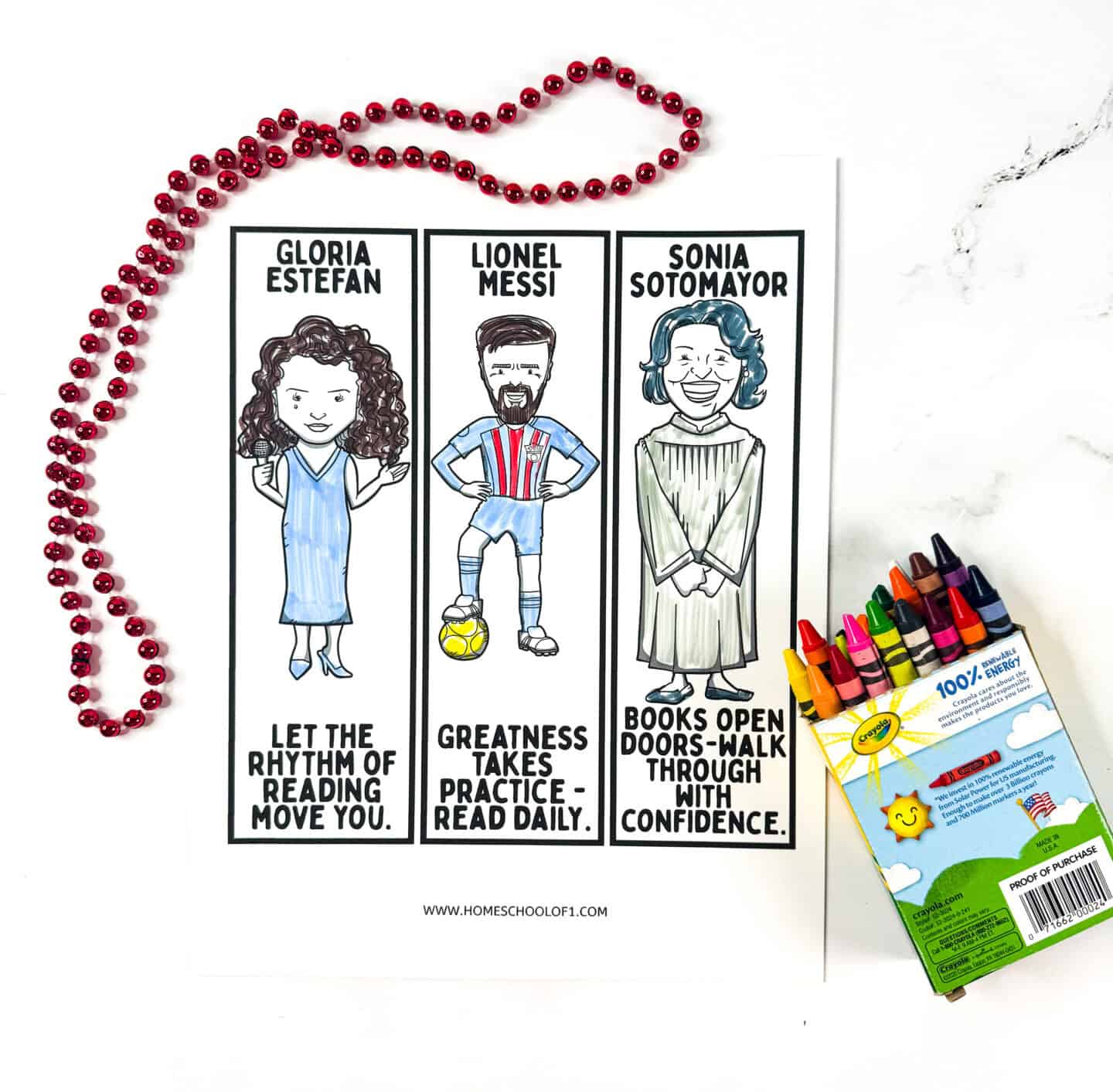 Bookmarks featuring Gloria Estefan, Lionel Messi, and Sonia Sotomayor alongside red beads and crayons.