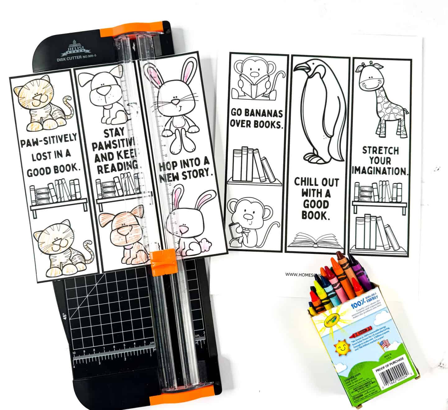 Printable animal bookmarks with reading quotes such as “Stay pawsitive” and “Chill out with a good book,” shown partly colored with crayons.