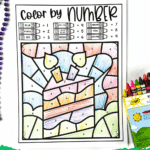 Birthday color by number page with a cake and candles, colored using crayons, with a green border.