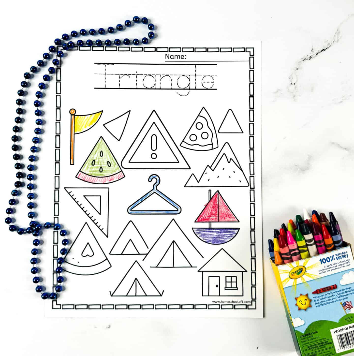 Printable triangle coloring page for kids showing pizzas, flags, mountains, tents, hanger, sailboat, and other three-sided objects.