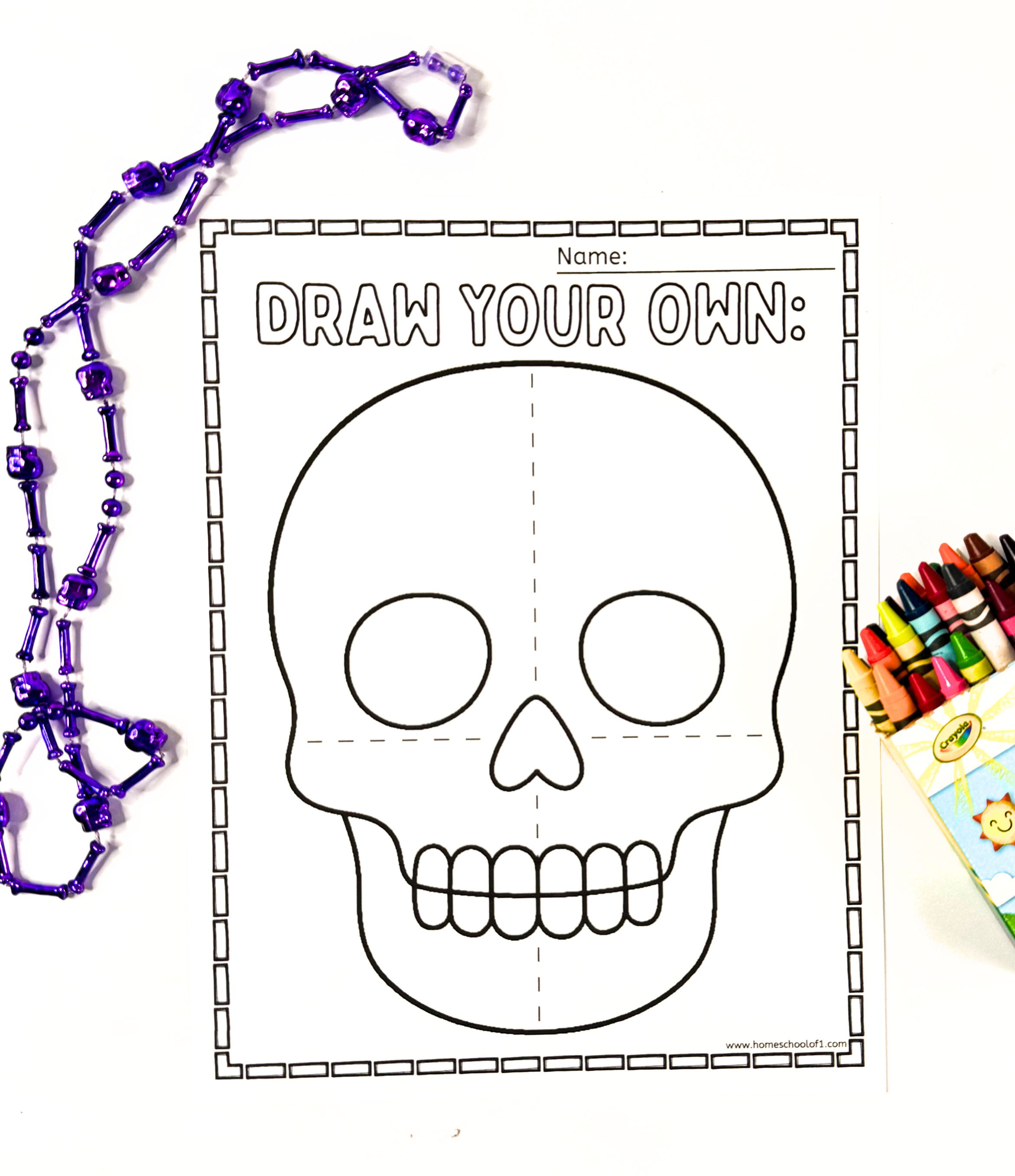 Printable Day of the Dead “Draw Your Own” sugar skull coloring page with crayons and purple beads.