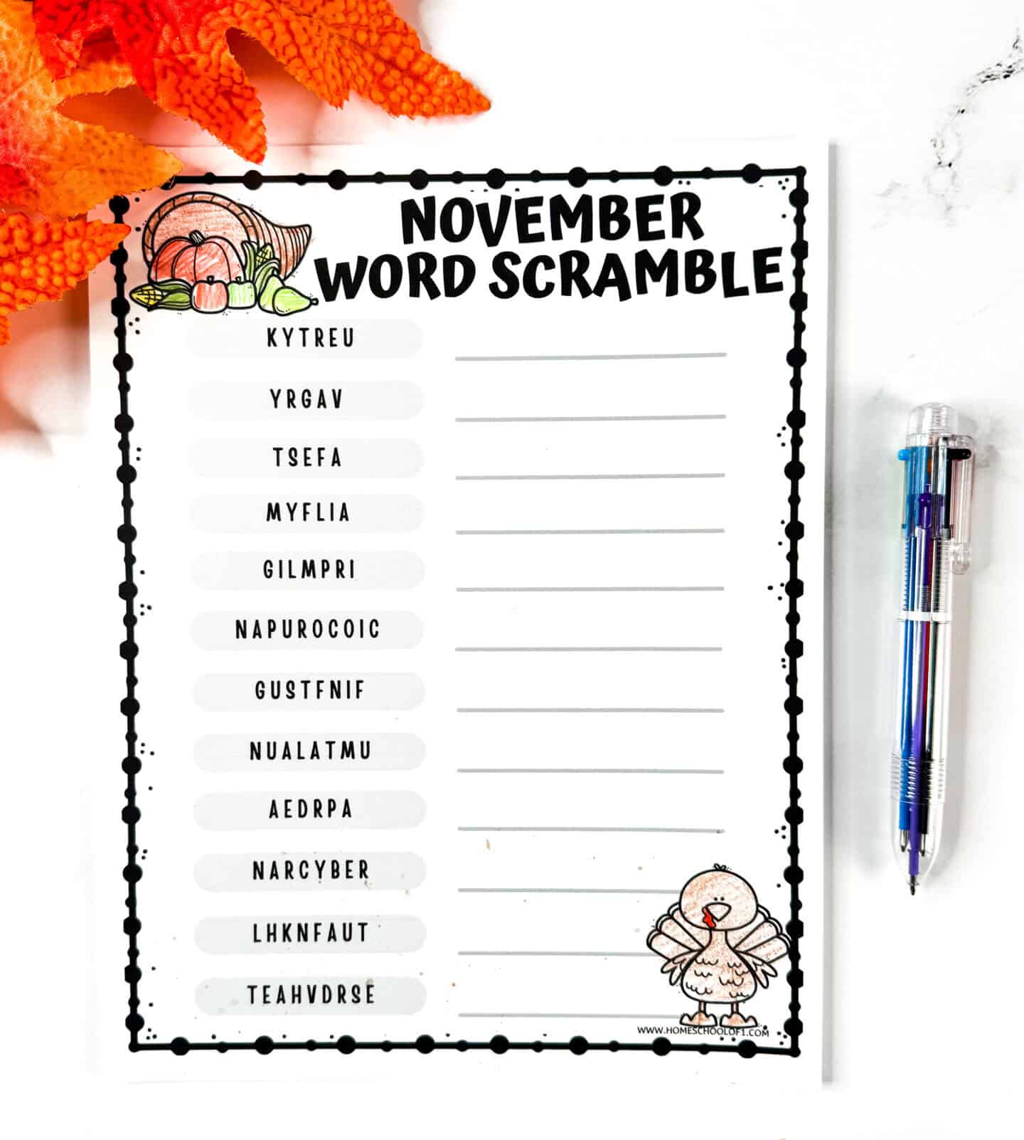 Free November word scramble printable showing fall-themed design with a cornucopia and turkey illustration.
