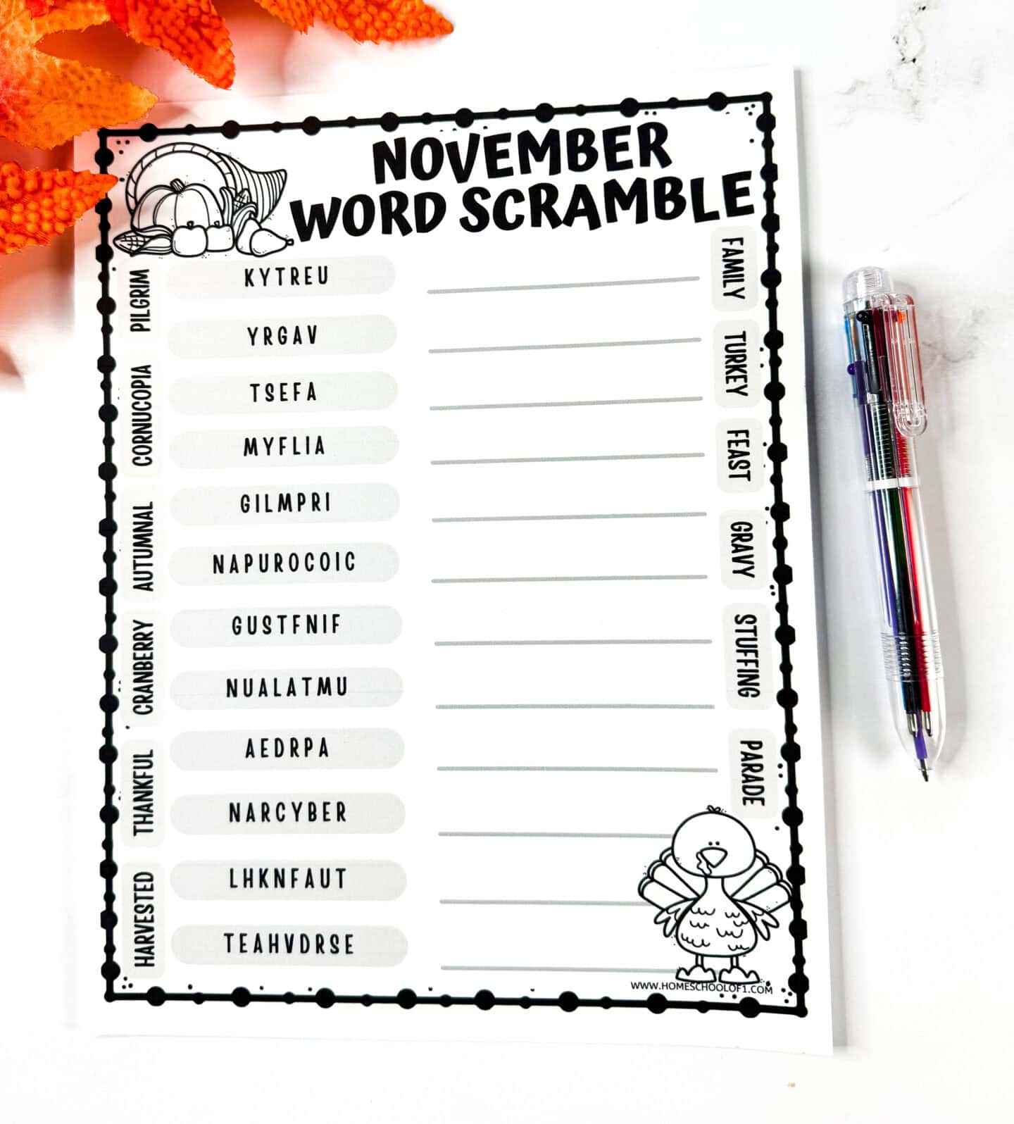 Printable November word scramble worksheet with Thanksgiving-themed words and a word bank around the border.