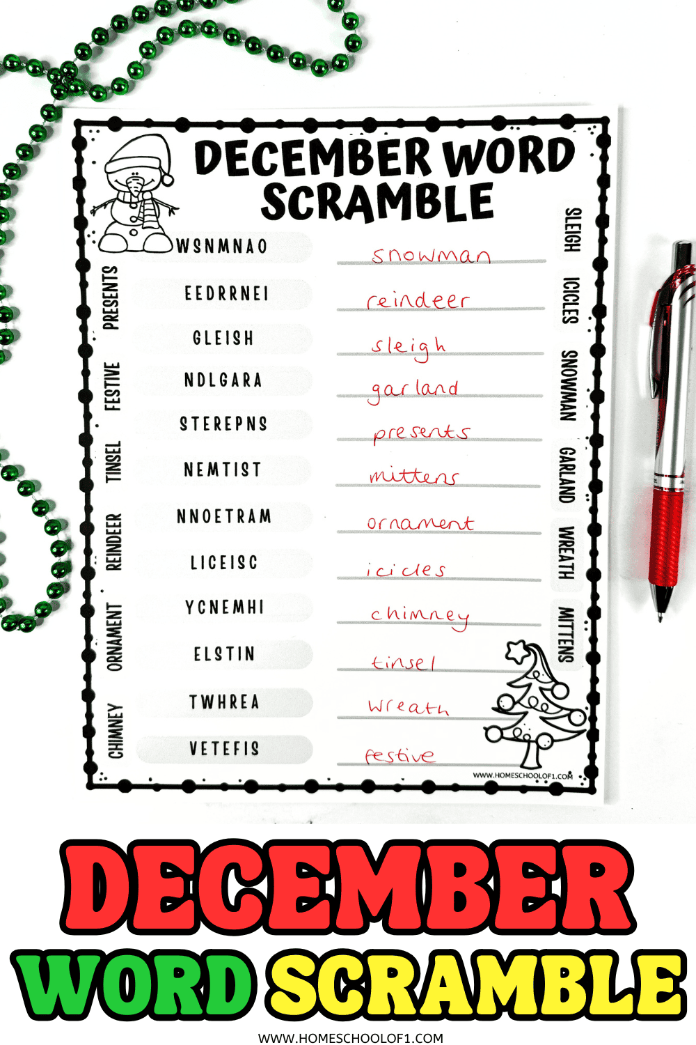 Completed December word scramble worksheet with red handwritten answers and green Christmas beads.