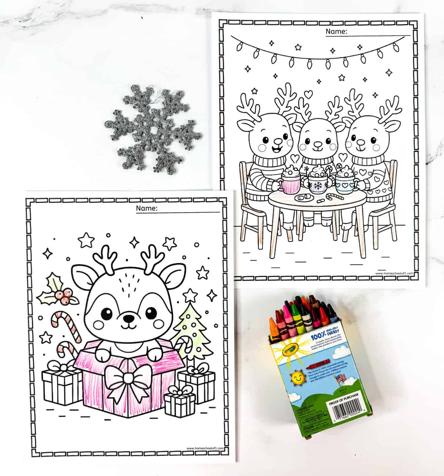 Cute reindeer coloring pages featuring a kawaii reindeer in a gift box and reindeer friends with cocoa.