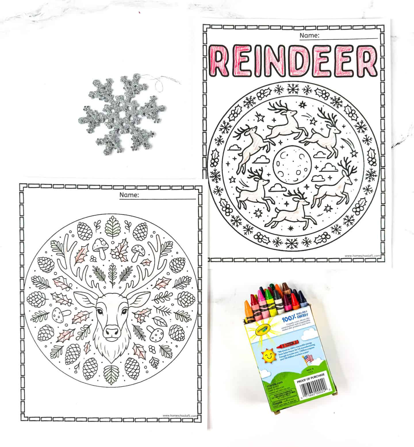 Reindeer mandala coloring pages with flying reindeer, forest details, crayons, and a silver snowflake.