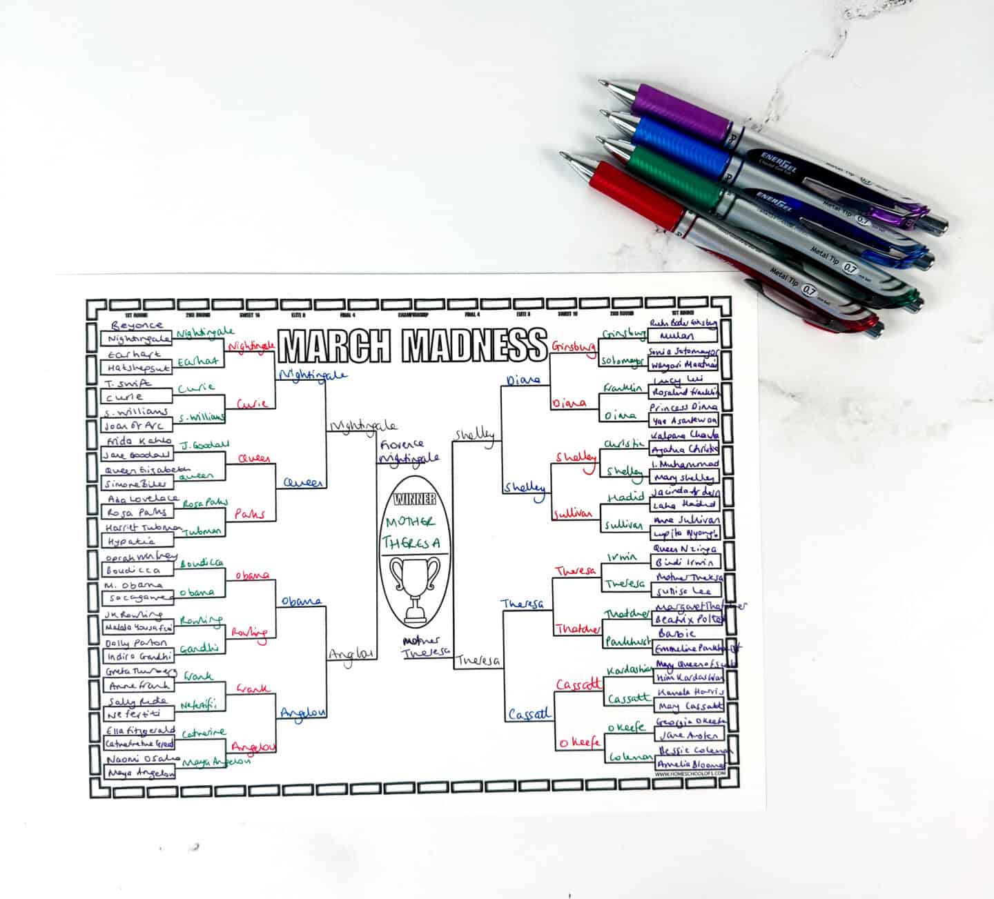 blank March Madness bracket printable with pens ready to fill in